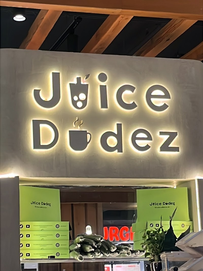 Juice Dudez illuminated storefront sign